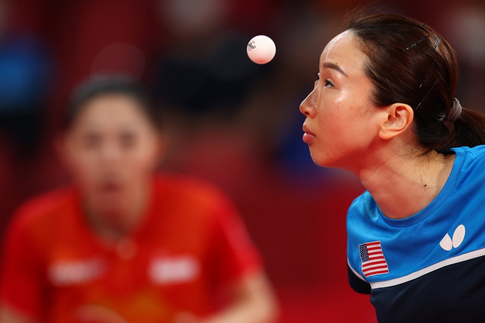 Juan Liu of the United States in action against Yu Mengyu of Singapore 
