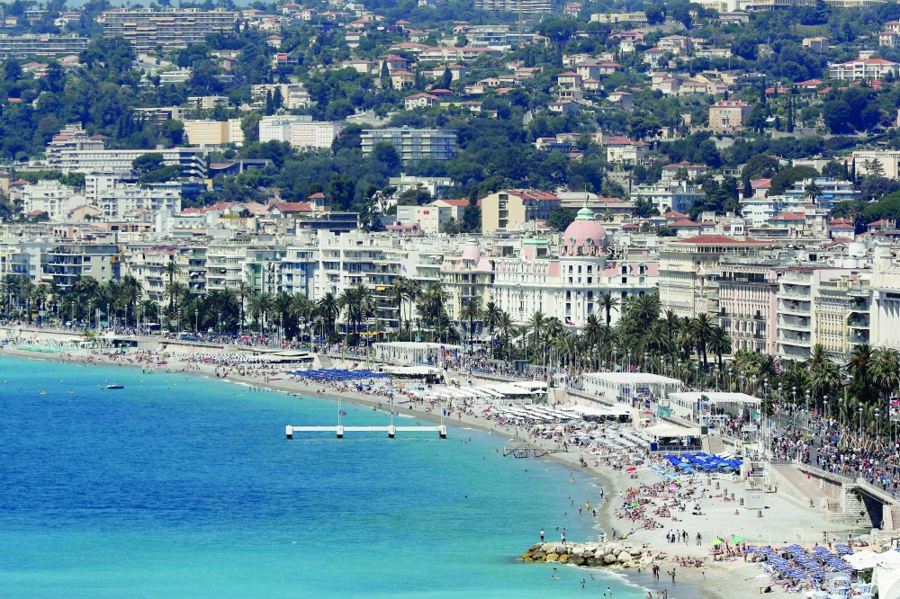 A general view of the beach and the Promenade des Anglais in the French riviera city of Nice. - AFP 