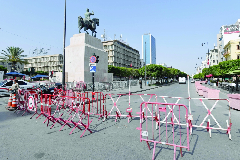 Tunisian police barricade the Habib Bourguiba avenue in Tunis on Tuesday. - AFP 