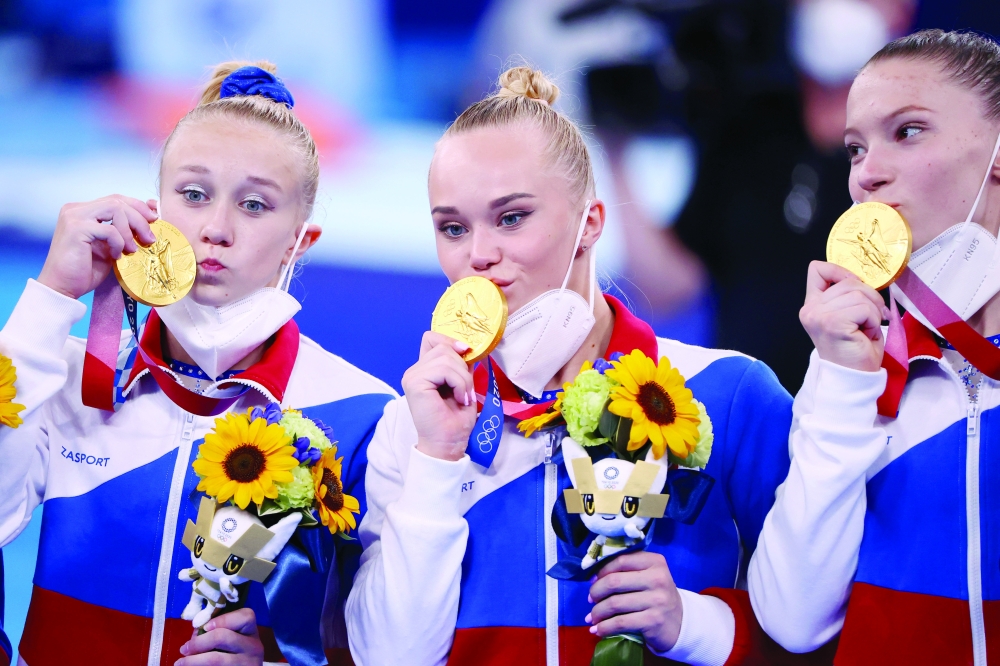 Gold medallists Viktoriia Listunova Angelina Melnikova and Vladislava Urazova of the Russian Olympic Committee pose with medals. -- Reuters 