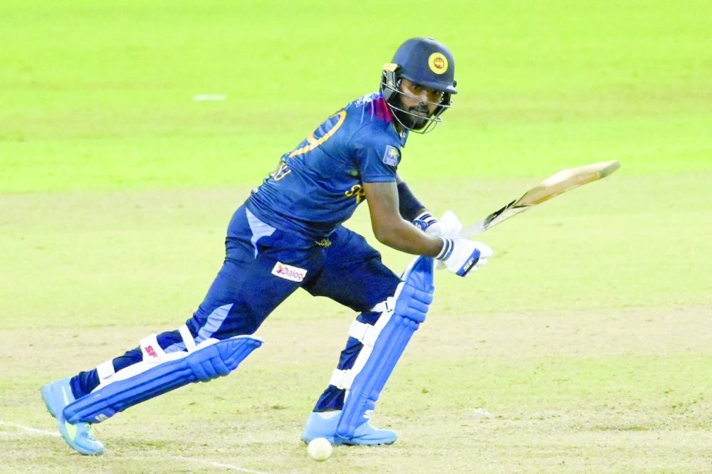 Sri Lanka's Wanindu Hasaranga plays a shot during the third Twenty20 international. -- AFP