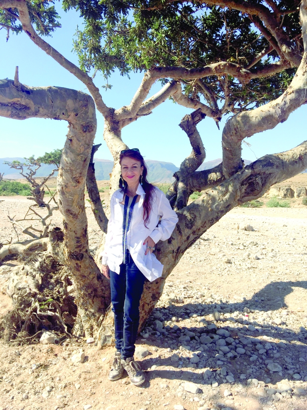 Fabienne Herbane beside a Frankinsense tree in Salalah