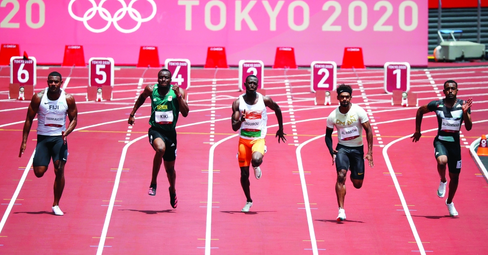 Mohamed Alhammadi of United Arab Emirates, Barakat Al-Harthi of Oman, Badamassi Saguirou of Niger, Didier Kiki of Benin and Ratu Banuve Tabakaucoro of Fiji in action in Heat 2. -- Reuters