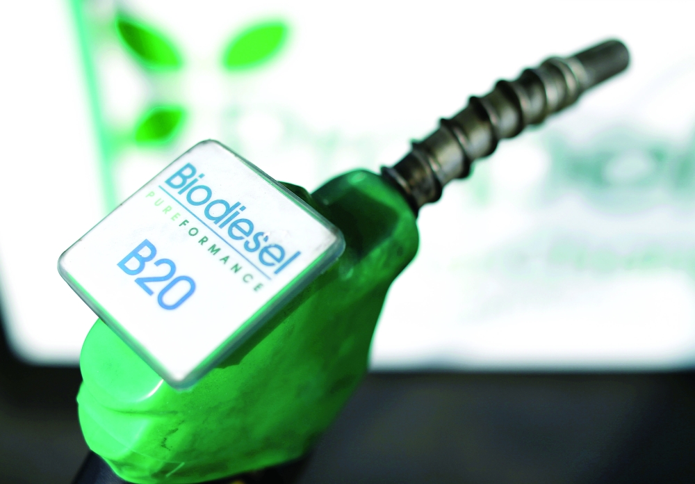 A fuel nozzle from a bio diesel fuel pump is seen in this photo illustration taken at a filling station in San Diego, California. — Reuters