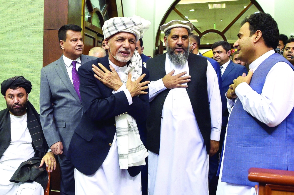 Afghanistan's President Ashraf Ghani arrives for a meeting at the Afghan Parliament house in Kabul. - AFP