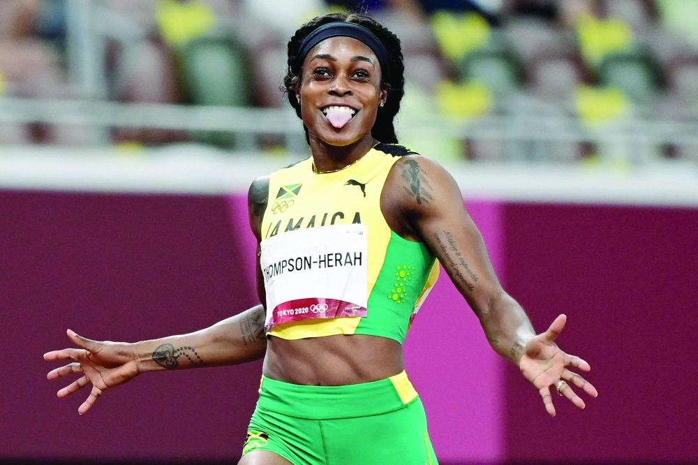 Jamaica's Elaine Thompson-Herah wins the women's 200m final. -- AFP