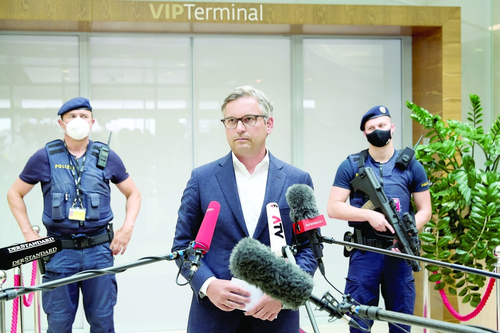 Magnus Brunner, Austrian State Secretary in the Federal Ministry for Climate Protection, Environment, Energy, Mobility, Innovation and Technology, addresses the press at the VIP-Terminal after the arrival of Belarusian sprinter Krystsina Tsimanouskaya at Vienna Airport, on Wednesday. - Reuters