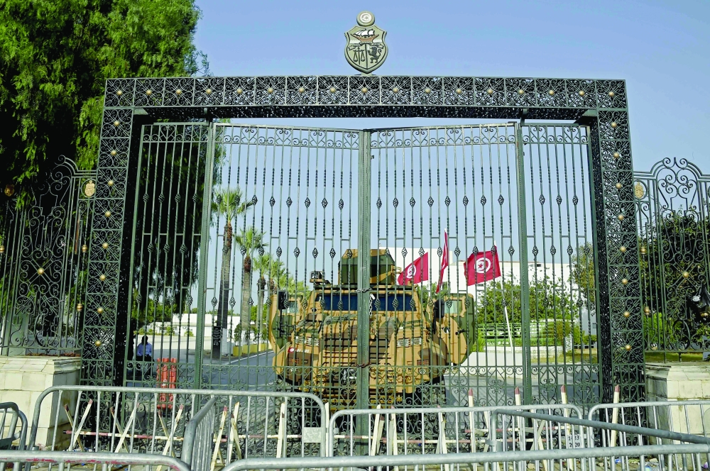 Tunisian army barricade the parliament building in the capital Tunis, after the president dismissed the prime minister and ordered parliament closed for 30 days. - AFP file photo