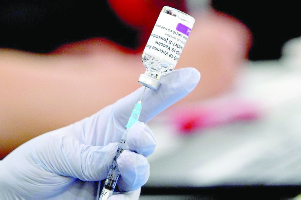 The nursing assistant received AstraZeneca's shot on March 12 and later suffered from double vision and paralysis. - AFP