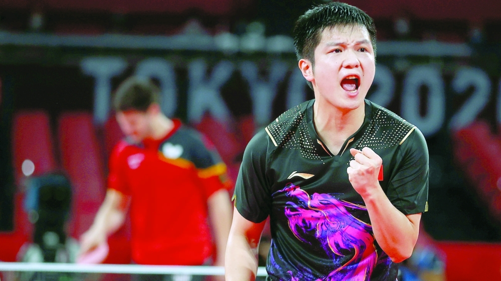 Fan Zhendong of China reacts during his match against Dimitrij Ovtcharov of Germany. -- Reuters