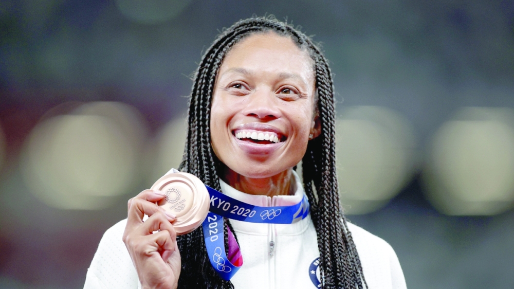 Bronze medallist Allyson Felix of the United States on the podium. -- Reuters