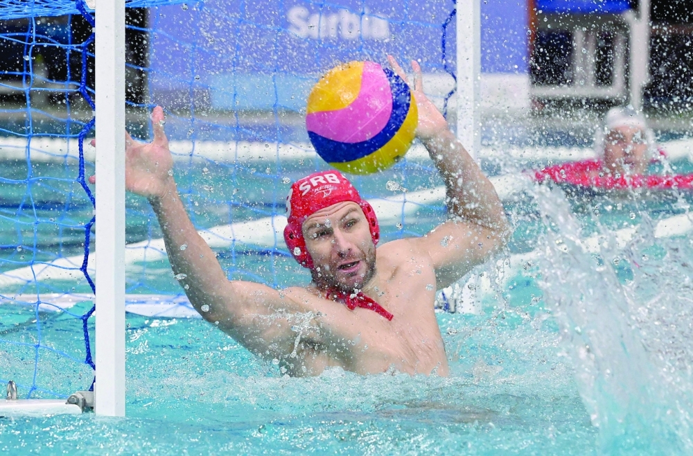 Serbia's goalkeeper Branislav Mitrovic makes a save during the Tokyo 2020 Olympic Games men's water polo semi-final match. -- AFP

