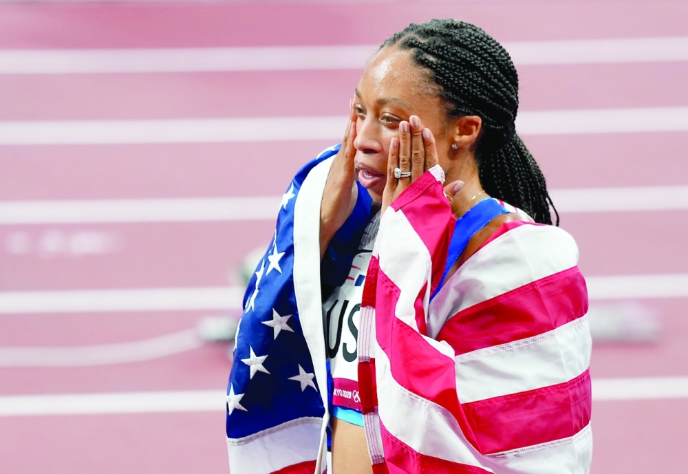 Allyson Felix of the United States reacts after winning gold. -- Reuters