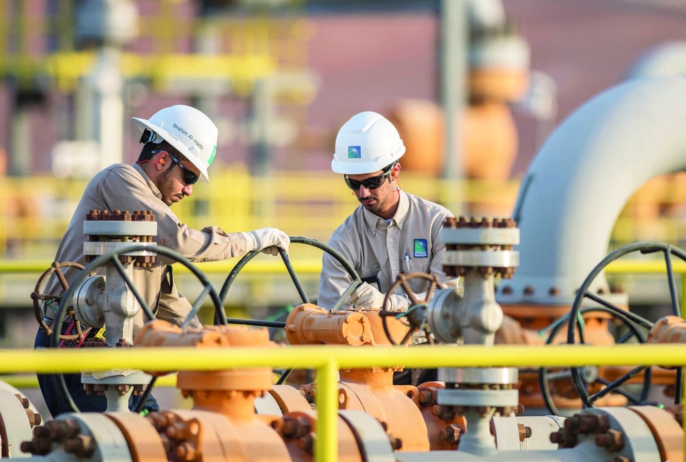 Engineers work at a Saudi Aramco facility in Saudi Arabia. — AFP
