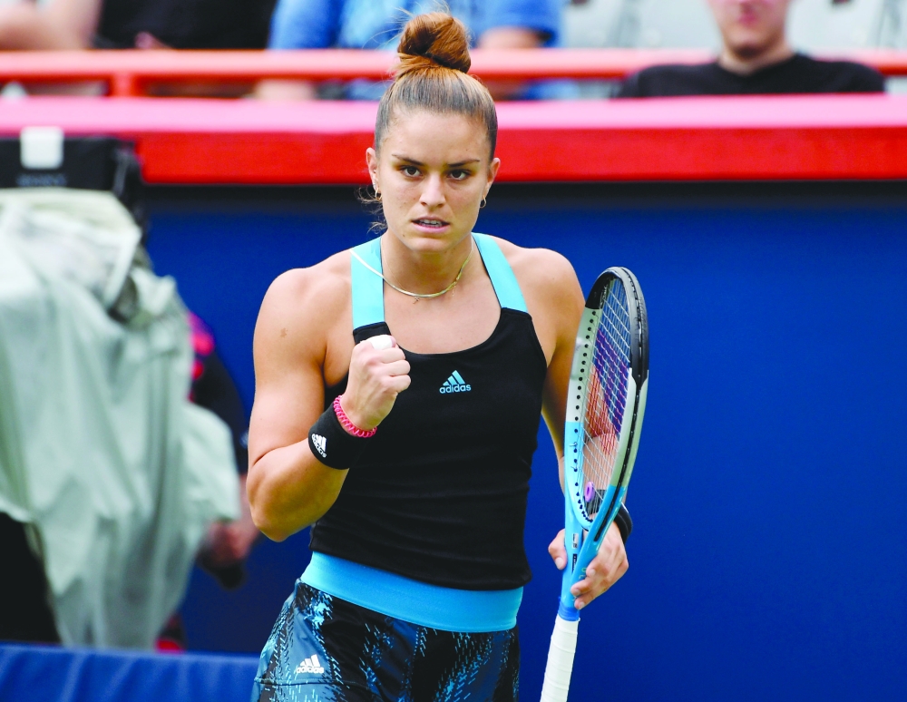 Maria Sakkari of Greece reacts after making a point against Maria Bouzkova of the Czech Republic in Montreal. -- USA Today Sports