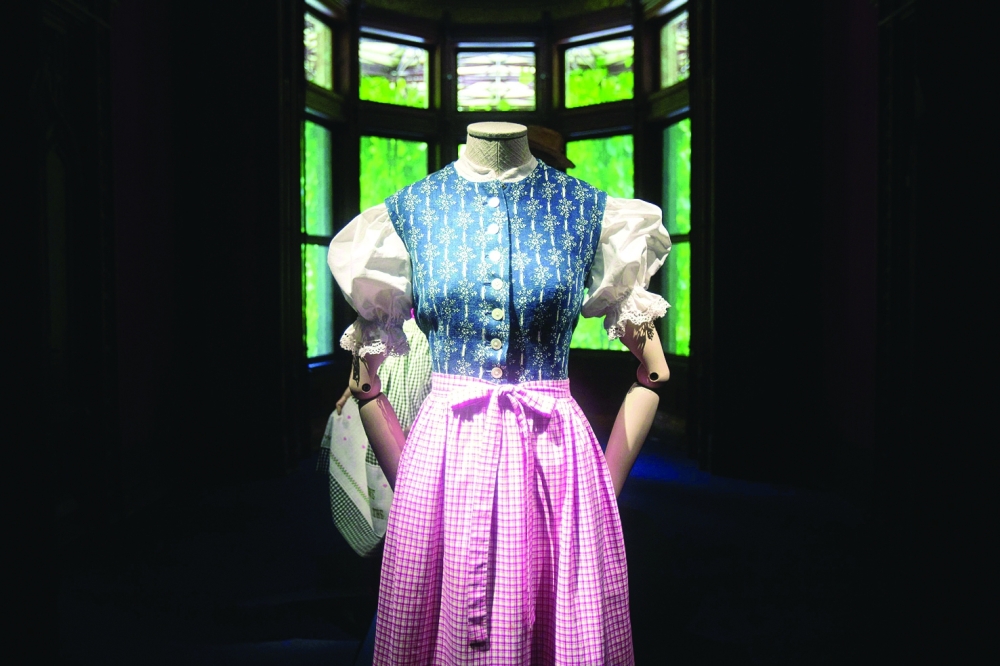 Dirnd dresses are on display at the exhibition "Dirndl - Tradition goes fashion" at the Mamorschloessl palace in Bad Ischl, Upper Austria, on June 24, 2021.  The Alpine 'dirndl' dress with its distinctive white blouse, round skirt and apron has won new fans among Austrians and foreign fashionistas alike in recent years -- and now a new exhibition is tracing the history of this iconic garment.