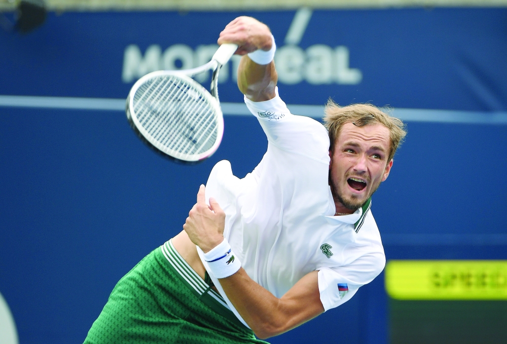 Daniil Medvedev of Russia serves against Alexander Bublik of Kazakhstan in Toronto. -- USA Today Sports
