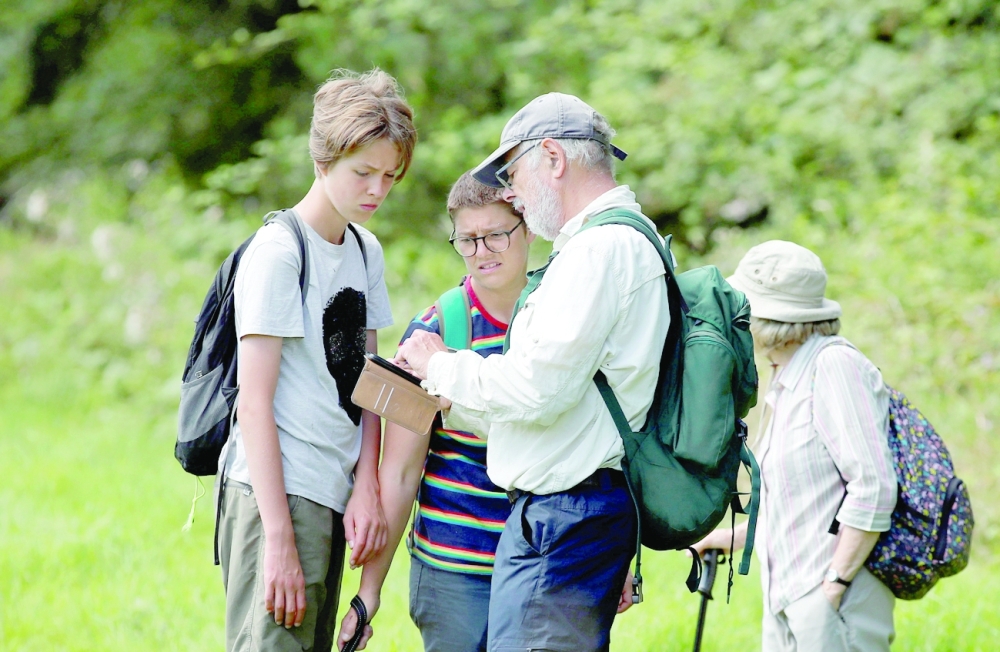 Jude Walker who is walking from Yorkshire to London over 21 days with his mum Tamsin Walker to raise awareness for 'the zero carbon campaign' petition in Milton Keynes. - Reuters 