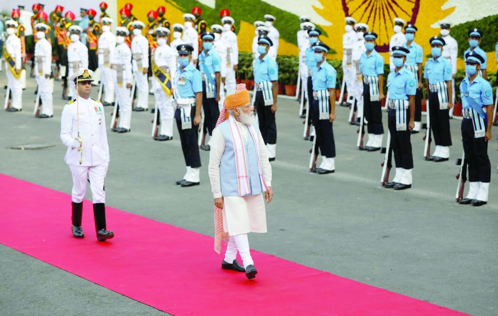 Indian Prime Minister Narendra Modi inspects the honour guard during Independence Day celebrations at the historic Red Fort in Delhi, India. — Reuters