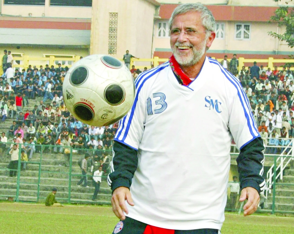 Gerd Mueller looks on after kicking the ball before the start of a friendly between FC Bayern Munich-II and a Siliguri Mayor's 11 at Kanchenjungha Stadium in Siliguri on January 21, 2009. -- AFP