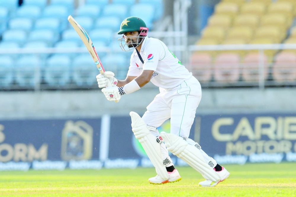 Babar Azam of Pakistan hits a 4 during day 3 of the first Test against West Indies. --  AFP