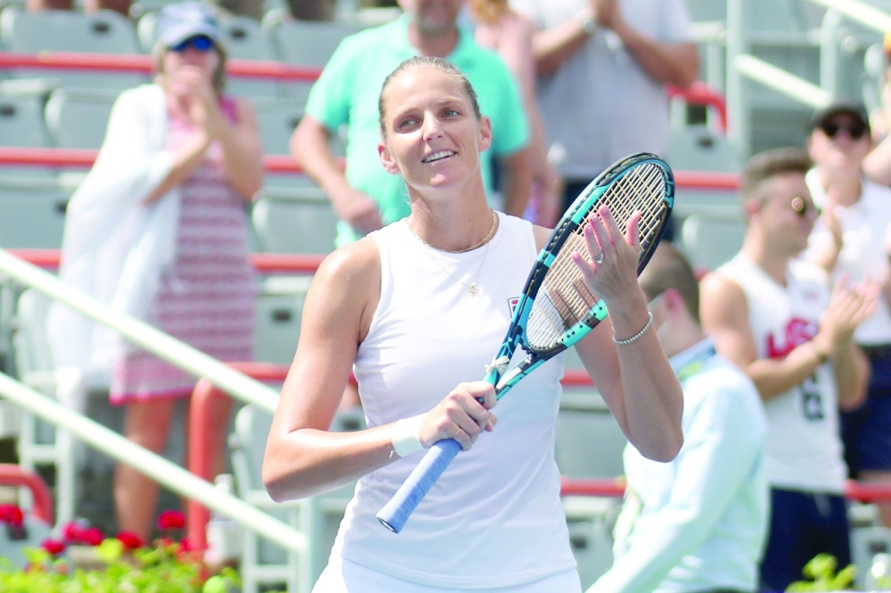 Karolina Pliskova from Czech Republic applauds to the crowd after her win against Aryna Sabalenka from Belarus during the semifinals at Stade IGA. -- USA Today Sports