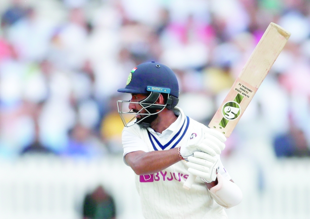 India's Cheteshwar Pujara in action. -- Reuters 