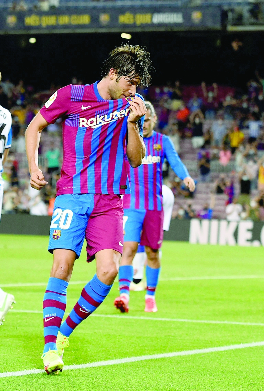 Barcelona’s Sergi Roberto celebrates after scoring during the Spanish League match against Real Sociedad. — AFP