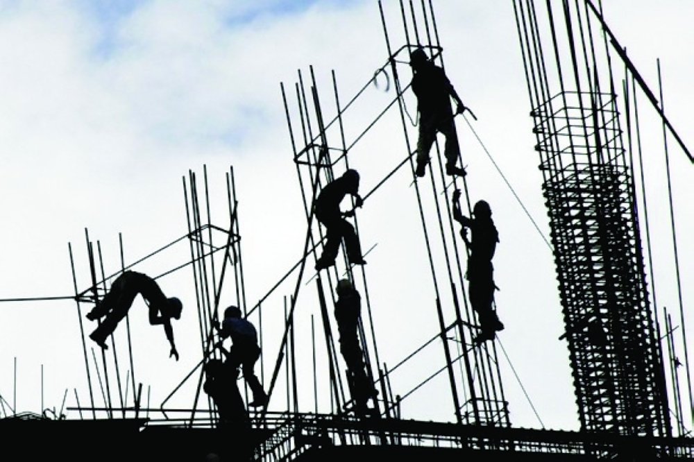 Construction workers are seen at Bonifacio global city in Philippines. — Reuters