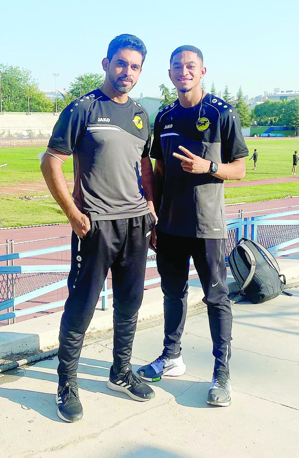 Ali al Balushi with coach