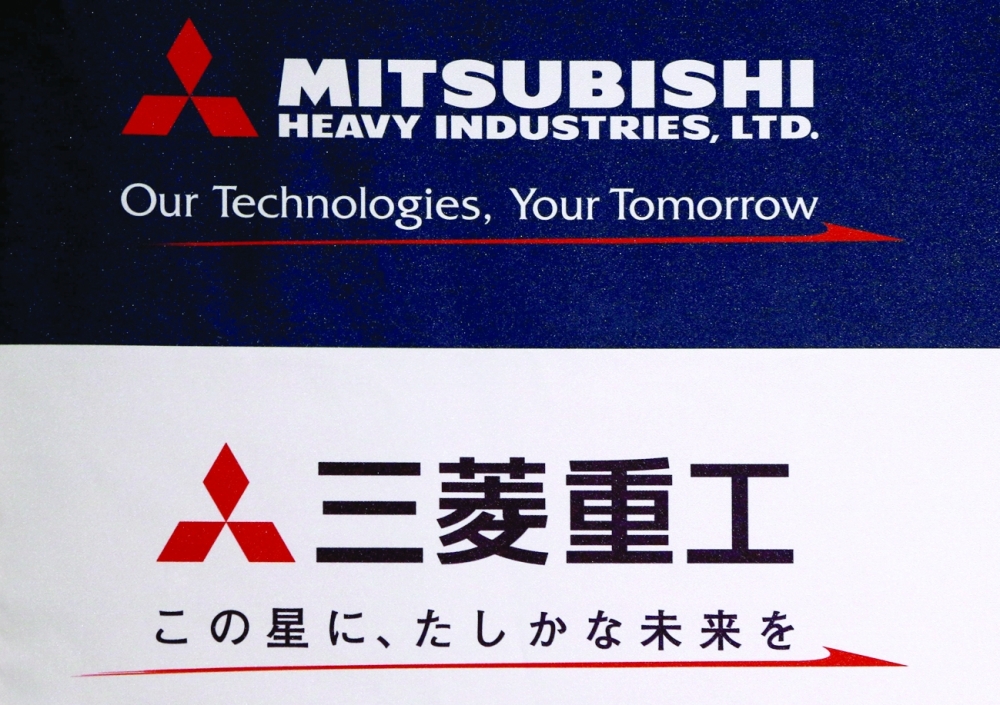 The logo of Mitsubishi Heavy Industries is seen at the company's news conference in Tokyo. Reuters File
