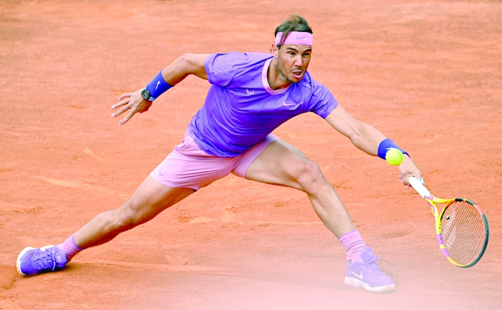 Spain's Rafael Nadal returns the ball to Germany's Alexander Zverev during their tennis match at the Men's Italian Open at Foro Italico in Rome, Italy. -- AFP

