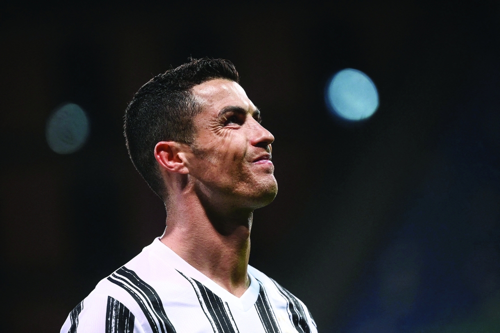 In this file photo taken on May 12, 2021 Juventus' forward Cristiano Ronaldo reacts during the Serie A match against Sassuolo. -- AFP