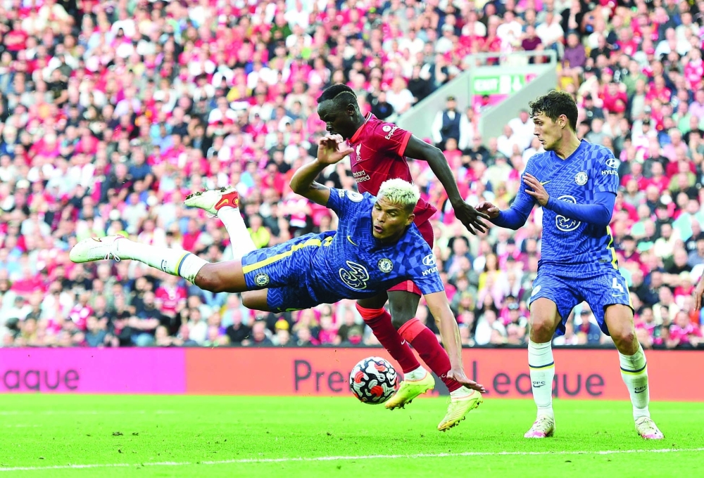 Chelsea's Thiago Silva and Andreas Christensen in action with Liverpool's Sadio Mane. -- Reuters