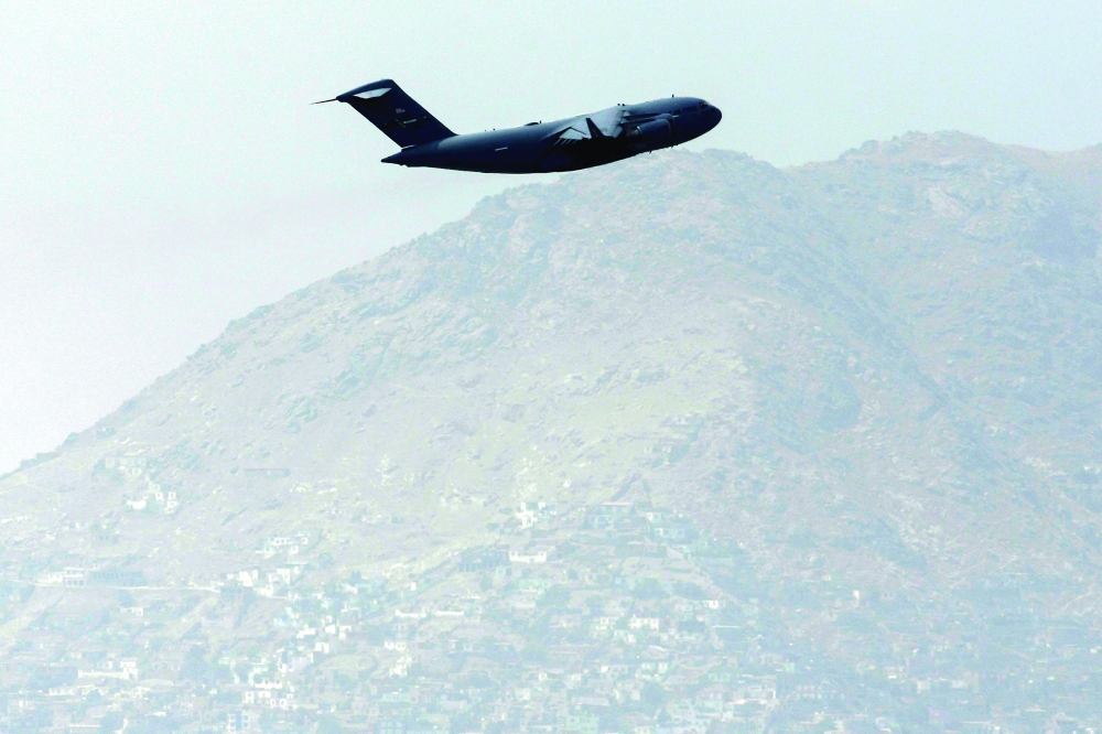 An US Air Force aircraft takes off from the airport in Kabul on Monday. - AFP