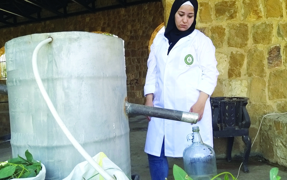 A worker prepares soap in a traditional ways in Koura. -- Ruters
