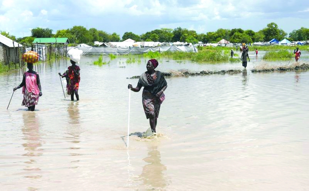 Rising waters triggered by early seasonal rainfall have deluged farmland, killing livestock and destroying flimsy thatched huts, a year after record floods affected some 700,000 people. -- Reuters