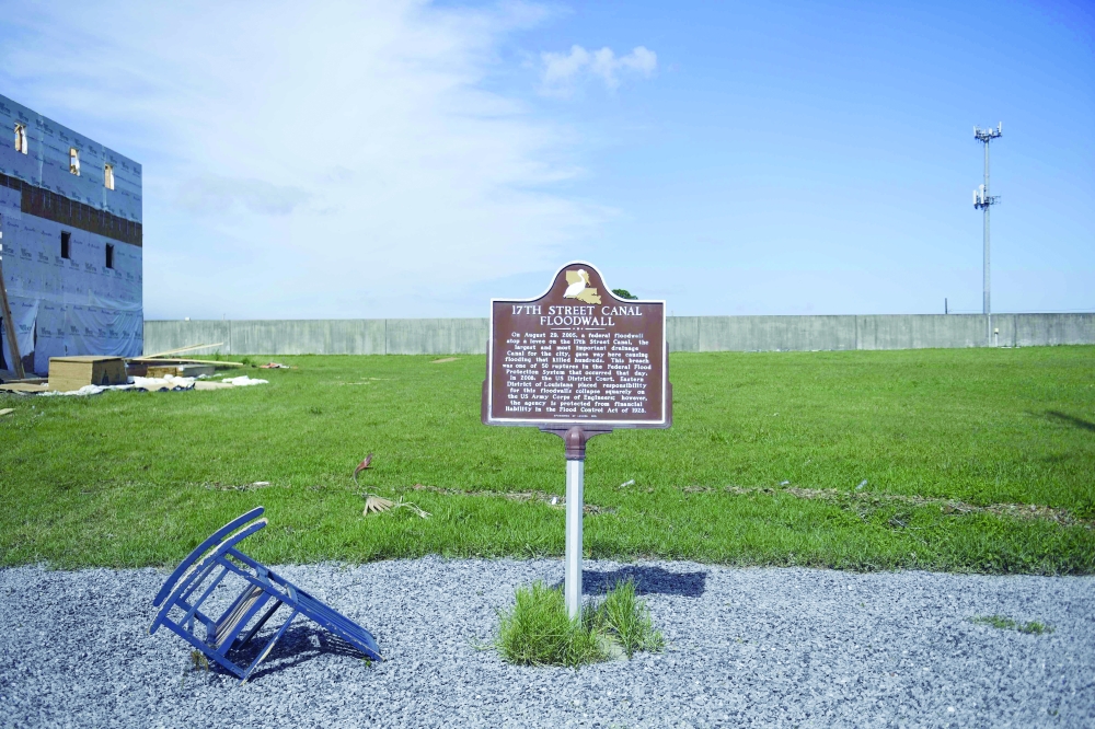 A sign for the 17th Street Canal Floodwall, the largest and most important drainage canal is seen in New Orleans in the aftermath of Hurricane Ida. - AFP