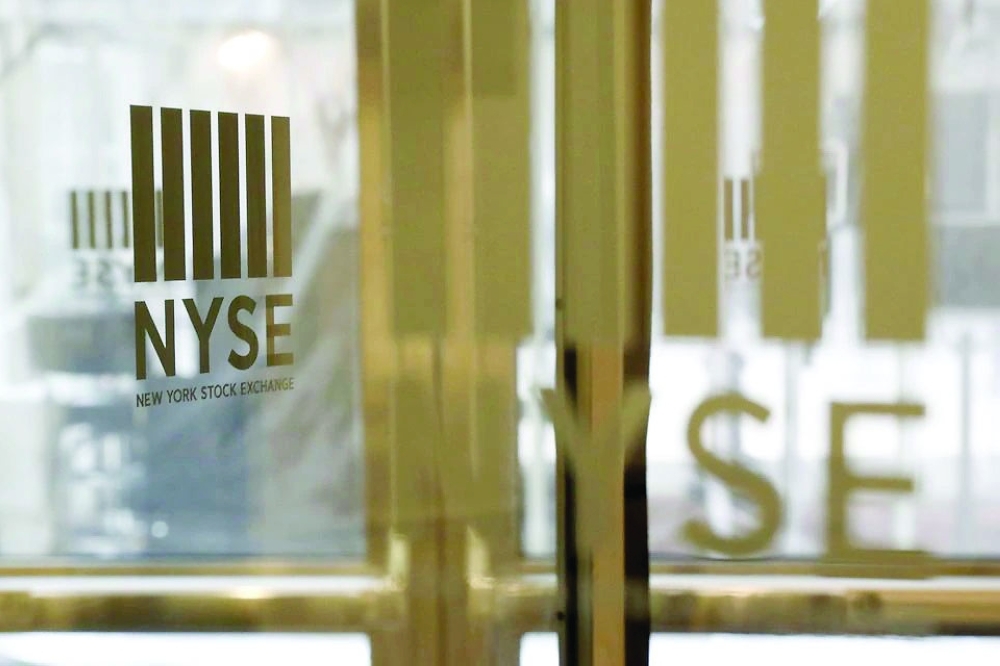 The logo of the New York Stock Exchange (NYSE) is seen on the door in New York. - Reuters