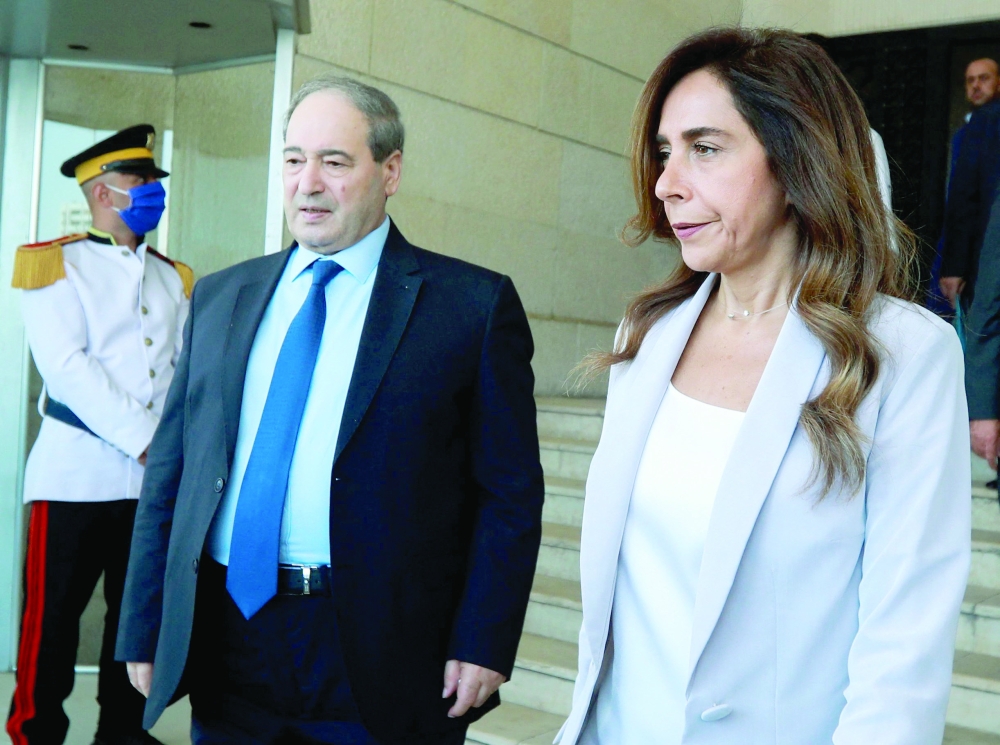 Syrian Foreign Minister Faisal Miqdad (L) and his Lebanese counterpart Zeina Akar leave a press conference following a meeting in the capital Damascus on Saturday. -- AFP 