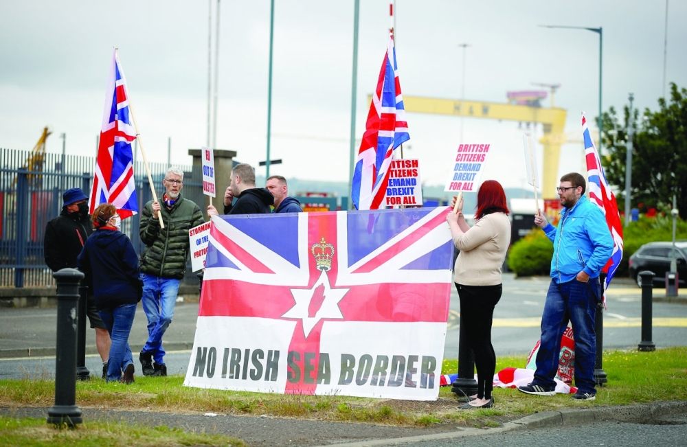 Loyalists protest against the Northern Ireland Brexit protocol at Belfast Harbour Estate. -- Reuters
