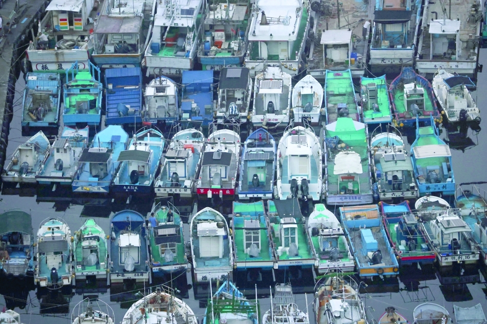 Fishing boats are seen at the harbour as Typhoon Chanthu expects to bring winds and rain in Yilan, Taiwan. -- Reuters
