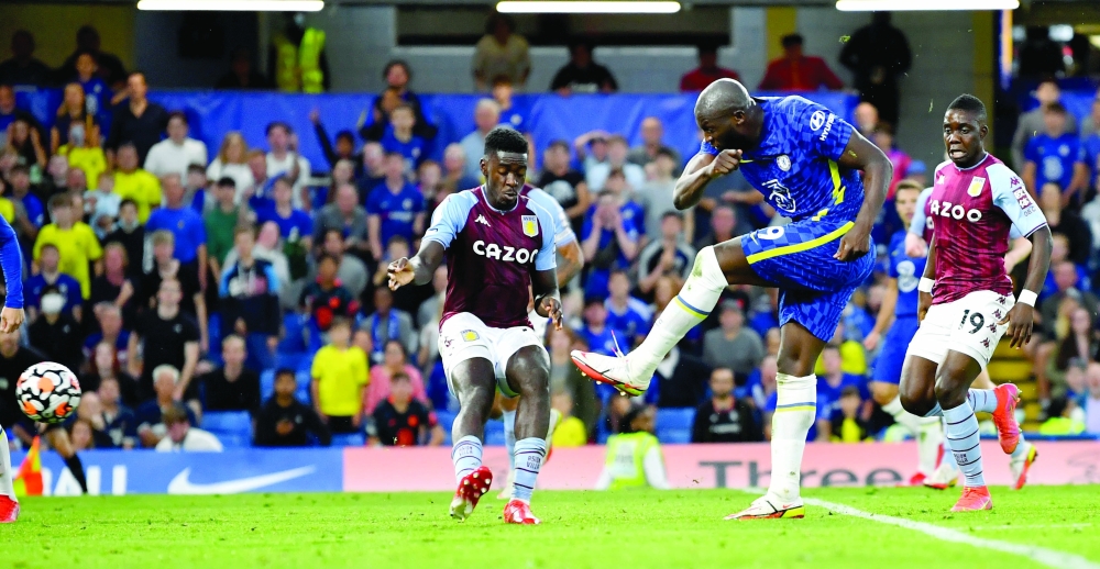 Chelsea's Romelu Lukaku scores their third goal. -- Reuters