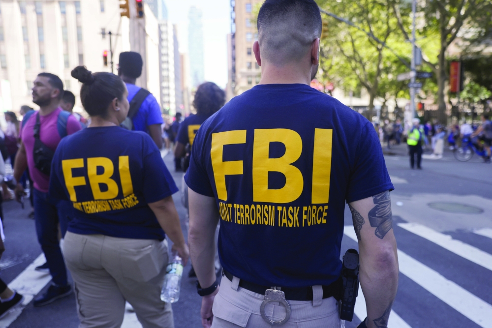 FBI agents stand guard near One World Trade Center during the 20th anniversary of the September 11, 2001 attacks in New York City. - Reuters
