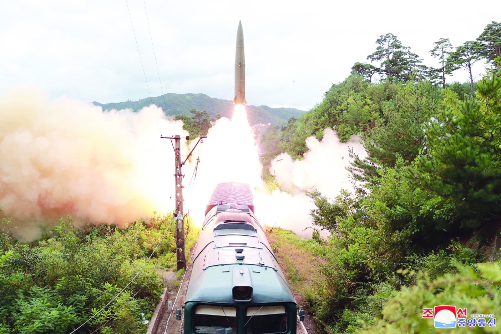A missile is seen launched during a drill of the Railway Mobile Missile Regiment in North Korea. -- Reuters