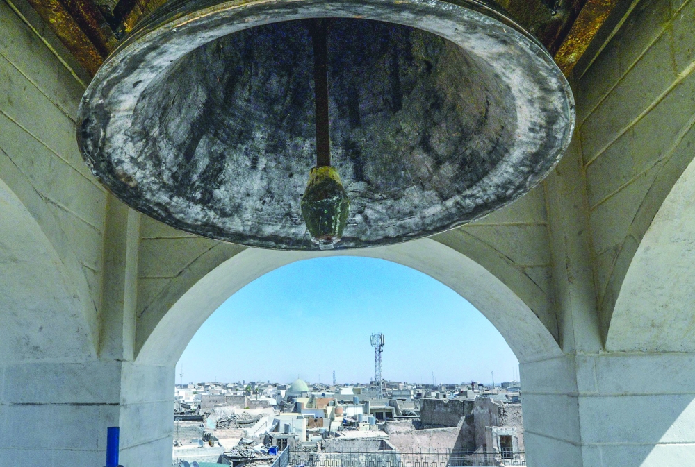 This picture shows the new bell at the Syriac Christian church of Mar Tuma in Iraq's second city of Mosul. - AFP