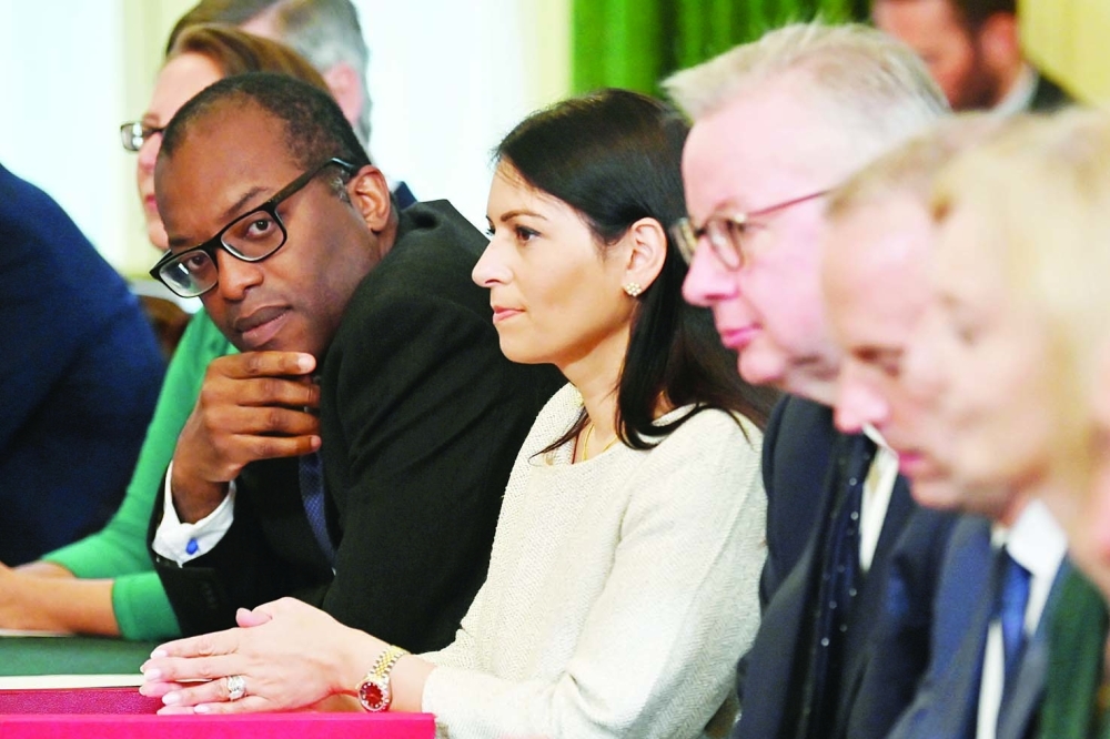 Britain's Business Secretary Kwasi Kwarteng, along with others attend attend  the first post-reshuffle cabinet meeting at Downing street, London. - Reuters
