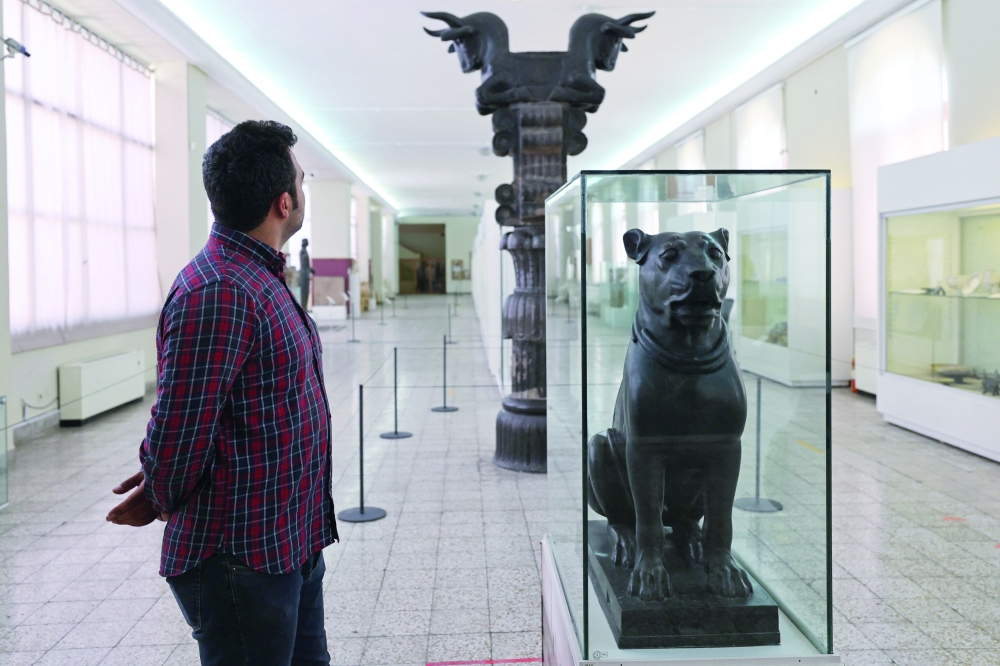 A man visits the National Museum of Iran in the capital Tehran on Sunday. - AFP