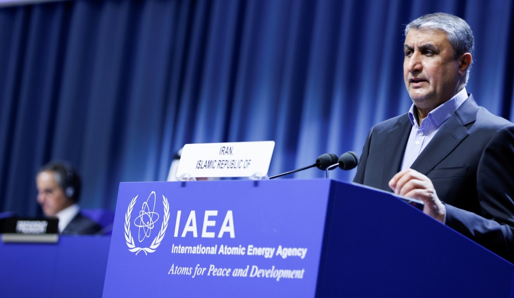 Iranian Atomic Energy Agency (IAEA) Chief Mohammad Eslami delivers his speech as IAEA Director General Rafael Grossi listens at the opening of the IAEA General Conference at their headquarters in Vienna, Austria, September 20, 2021. REUTERS/Leonhard Foeger
