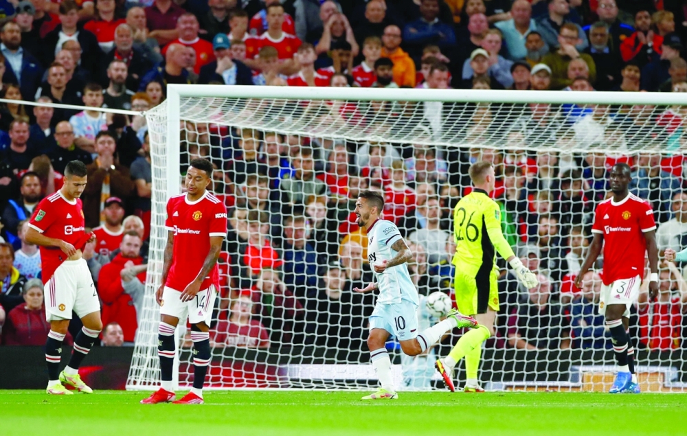 West Ham United's Manuel Lanzini celebrates scoring against Manchester United. -- Reuters